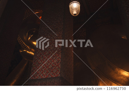 asia travel concept with golden buddha statue and old interior architecture at thailand temple 116962730