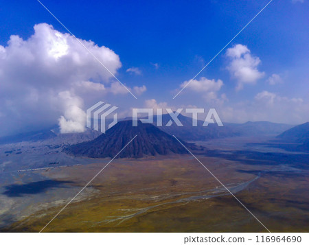 Aerial view of Mount Bromo, a volcano in East Java, Indonesia. Aerial view of Mount Bromo, a volcano in East Java, Indonesia. 116964690