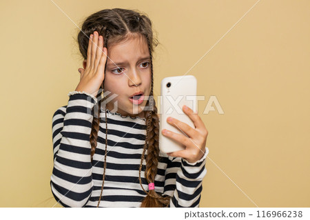 Upset sad child girl use smartphone play game loses loss fail unlucky news bad lottery result crisis 116966238