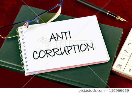 ANTI CORRUPTION word alphabet letters on a blank page of a notebook ANTI CORRUPTION word alphabet letters on a blank page of a notebook 116966669