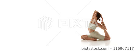 Banner. Young sporty woman in athletic wear posing during yoga session against white background with negative space to insert text. 116967117