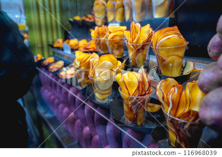 Kyoto, Japan - January 8, 2024: Street food in the bamboo forest of Arashiyama, Kyoto, Japan Kyoto, Japan - January 8, 2024: Street food in the bamboo forest of Arashiyama, Kyoto, Japan 116968039