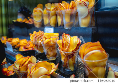 Kyoto, Japan - January 8, 2024: Street food in the bamboo forest of Arashiyama, Kyoto, Japan Kyoto, Japan - January 8, 2024: Street food in the bamboo forest of Arashiyama, Kyoto, Japan 116968040