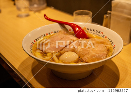 January 8, 2024: Osaka Shinza Ramen store interior scenery, food and Japanese sake, and a restaurant that is a specialty of the family. 116968257