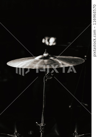 Drum kit, drum kit cymbal close-up. Preparation for the concert. Drummer's place close-up. Rock concert in the bar. black and white photo 116968570