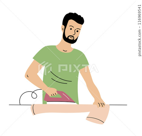 A young man irons clothes at home A young man irons clothes at home 116969541