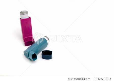 Asthma medications inhalers on a white background. Asthma medications inhalers on a white background. 116970023