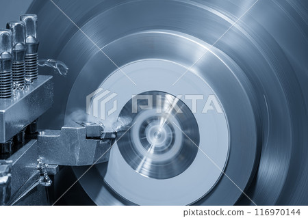 Closeup scene the lathe machine finish cut the metal parts in the light blue scene. Closeup scene the lathe machine finish cut the metal parts in the light blue scene. 116970144
