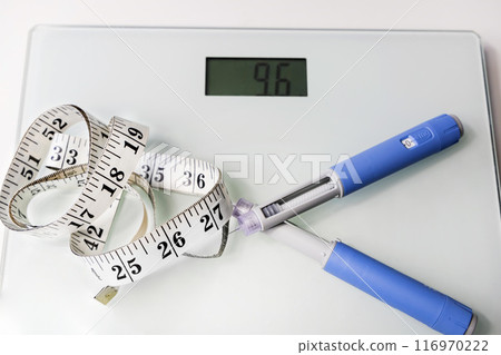 Ozempic Insulin injection pen for diabetics. Concept of losing weight with the drug. Ozempic Insulin injection pen for diabetics. Concept of losing weight with the drug. 116970222