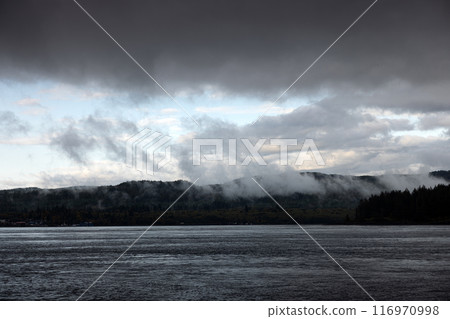 Cloud-covered mountains over British Columbia sea Cloud-covered mountains over British Columbia sea 116970998