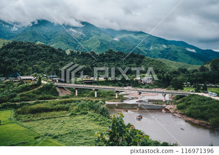 Greenery view of Sapan village a small village nestled in a forested northern valley of pure air and pristine rivers in Nan province of Thailand. Greenery view of Sapan village a small village nestled in a forested northern valley of pure air and pristine rivers in Nan province of Thailand. 116971396