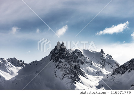 Grim mountain peak in French Alps 116971779