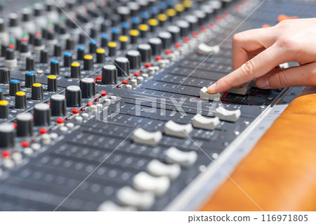 Closeup of audio mixer control panel Closeup of audio mixer control panel 116971805