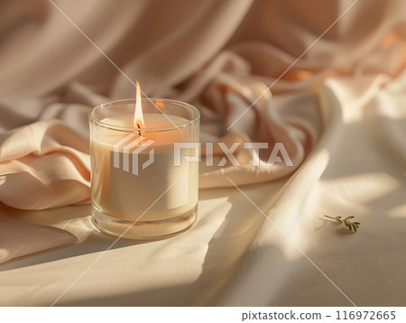 Candle mockup, A beautiful Serene Candle placed delicately on Soft Fabric illuminated with Gentle Lighting 116972665