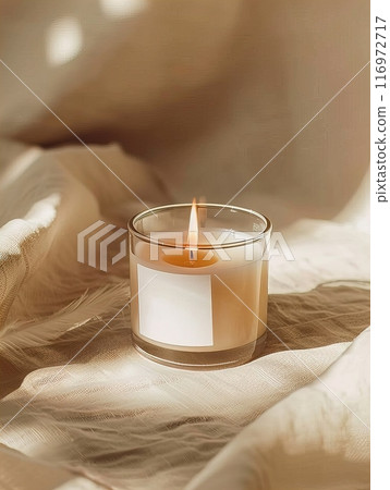 Candle mockup, An Aromatic Candle Wisely Burning on Soft, Elegant Fabric Creates a Cozy and Inviting Atmosphere 116972717