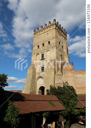 Guest patio in front of head tower of medieval fortress 116973106