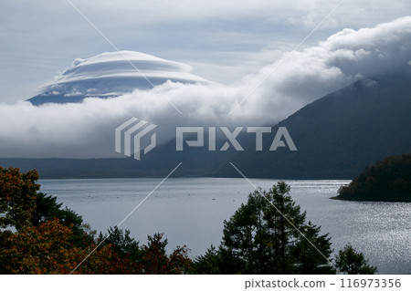 Mount Fuji hidden by umbrella clouds seen over Lake Motosu, Yamanashi Prefecture Mount Fuji hidden by umbrella clouds seen over Lake Motosu, Yamanashi Prefecture 116973356