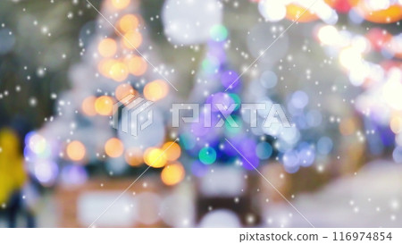 Abstract blurred background outdoors Christmas trees decorated glowing garlands light and falling snow. Christmas trees standing on street at night winter. Snow spots and snowfall. Animation backdrop Abstract blurred background outdoors Christmas trees decorated glowing garlands light and falling snow. Christmas trees standing on street at night winter. Snow spots and snowfall. Animation backdrop 116974854