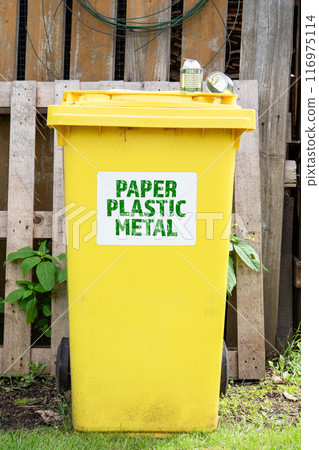 Paper Plastic Metal. Yellow waste sorting container. Terms and duty Paper Plastic Metal. Yellow waste sorting container. Terms and duty 116975114