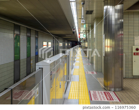 Platform screen doors installed at a subway station Platform screen doors installed at a subway station 116975360
