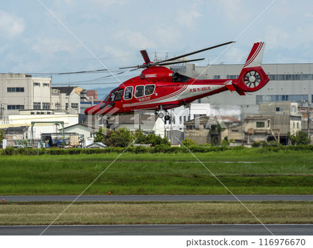 A helicopter of the Osaka City Fire Department takes off from Yao Airport A helicopter of the Osaka City Fire Department takes off from Yao Airport 116976670