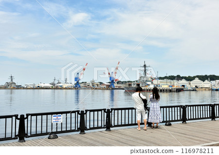 A couple holding a parasol at Yokosuka Verny Park A couple holding a parasol at Yokosuka Verny Park 116978211