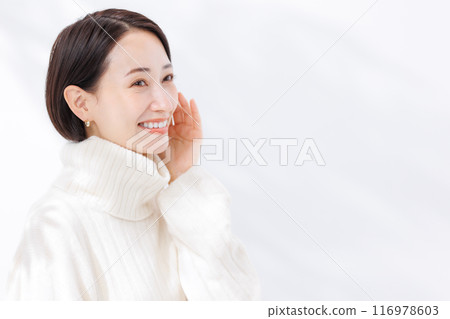woman wearing turtleneck knit 116978603