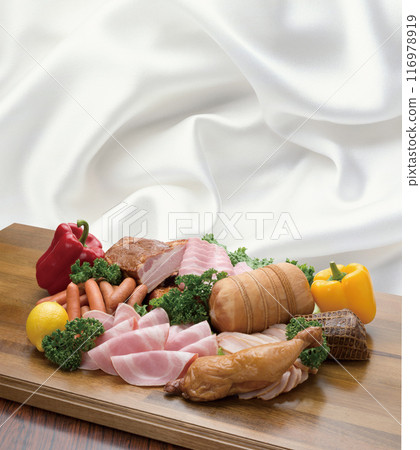 Bacon and vegetables on a cutting board 116978919