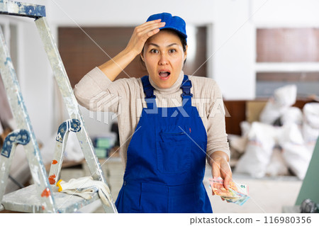 Female builder is unhappy with the money received for work done Female builder is unhappy with the money received for work done 116980356