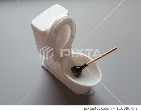 Image of a rubber plunger used to fix a clogged toilet leak Image of a rubber plunger used to fix a clogged toilet leak 116986472