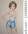 A cute girl with short hair is smiling in a relaxed pose wearing pastel lingerie. 116986850