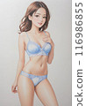 A cute girl with short hair is smiling in a relaxed pose wearing pastel lingerie. 116986855