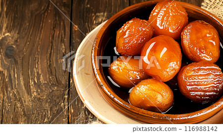 Close-up on sweet dough balls fried in oil and drizzled with honey, close-up on Turkish sweets 116988142