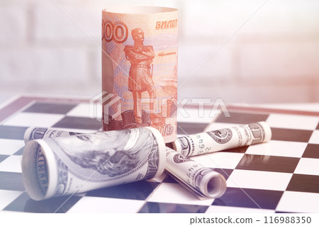 Russian rubles and American dollars on a chessboard Russian rubles and American dollars on a chessboard 116988350