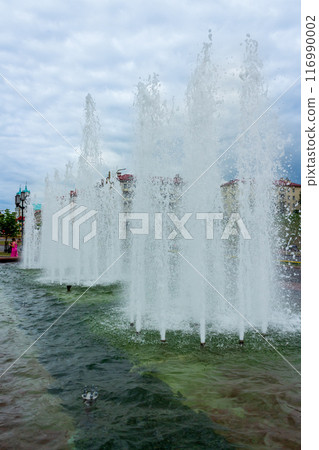 The beauty of a fountain on a sunny day 116990002