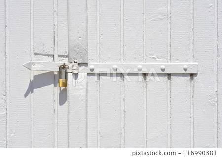 Gate with a padlock Gate with a padlock 116990381