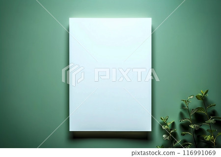 Empty white paper sheet isolated on green background Empty white paper sheet isolated on green background 116991069