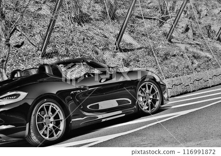 A shiny black convertible 116991872