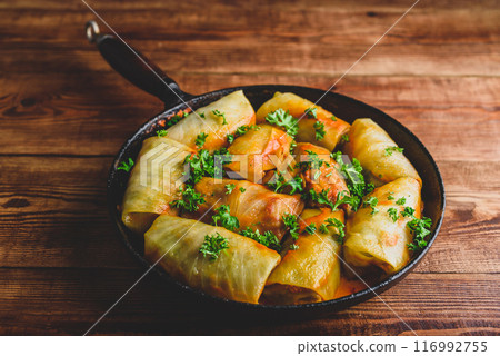 Frying Pan Full of Cabbage Rolls Stuffed with Minced Beef Frying Pan Full of Cabbage Rolls Stuffed with Minced Beef 116992755
