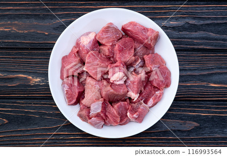 Beef cubes . Photography of raw cutting meat Beef cubes . Photography of raw cutting meat 116993564