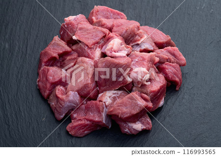 Beef cubes . Photography of raw cutting meat Beef cubes . Photography of raw cutting meat 116993565