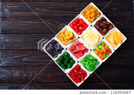 Group of dried and candied fruit in bowl Group of dried and candied fruit in bowl 116993667