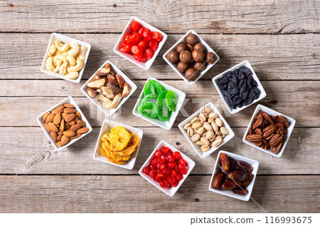 Mix of dried and candied fruits and nuts 116993675