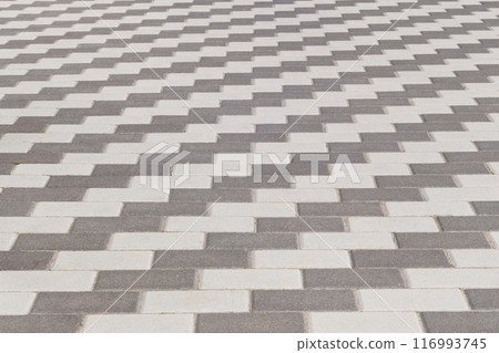 Grey Paving Tile, background. Pedestrian zone in city in daylight. 116993745