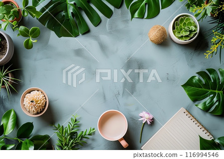 Flat lay table with a variety of plants and a cup of coffee, notebook with copy space 116994546