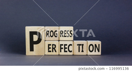Progress or perfection symbol. Concept word Progress Perfection on beautiful wooden cubes. Beautiful black background. Business progress or perfection concept. Copy space. 116995136