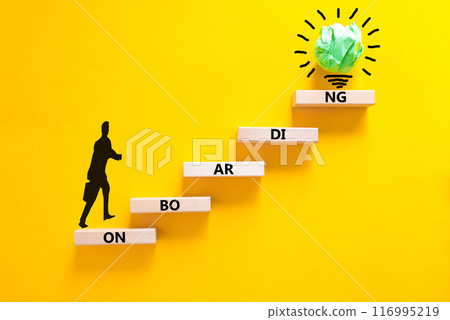 Onboarding success symbol. Concept word Onboarding on wooden blocks. Businessman icon. Beautiful yellow background. Business onboarding success concept. Copy space. 116995219