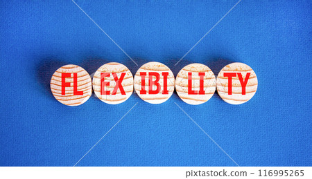 Flexibility symbol. Concept word Flexibility on beautiful wooden circles. Beautiful blue background. Business flexibility concept. Copy space. Flexibility symbol. Concept word Flexibility on beautiful wooden circles. Beautiful blue background. Business flexibility concept. Copy space. 116995265