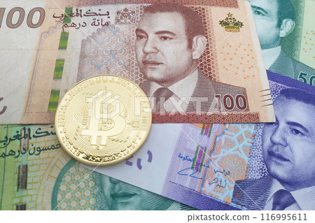 Bitcoin on a stack of Moroccan dirham banknotes 116995611