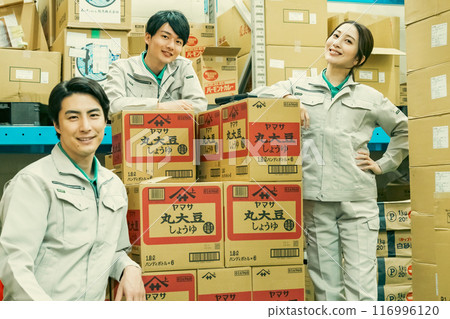 Warehouse managers having a meeting in front of the inventory Warehouse managers having a meeting in front of the inventory 116996120